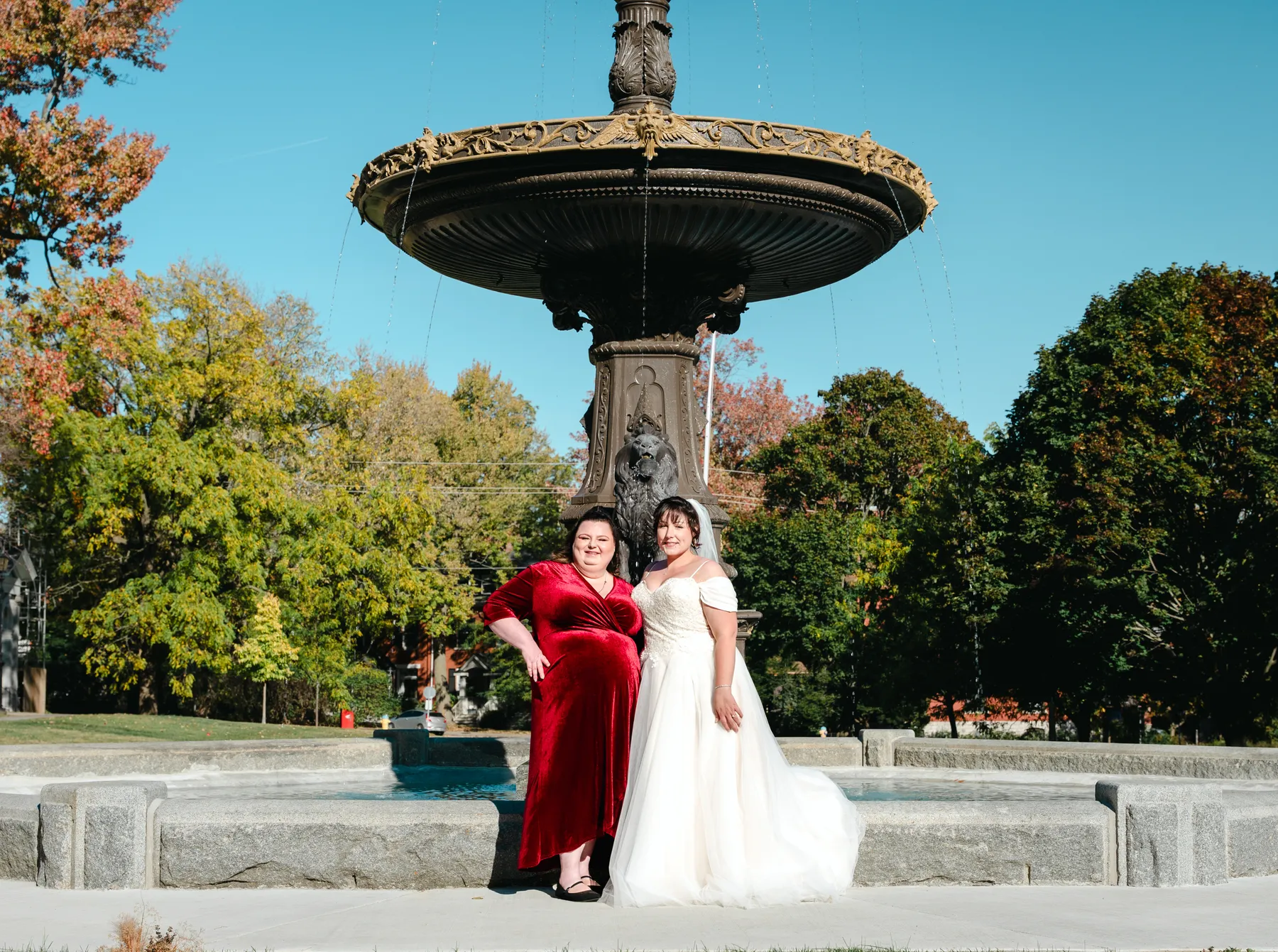 The bride with bridesmaids beside the fountain at Kody and Jaz’s wedding.