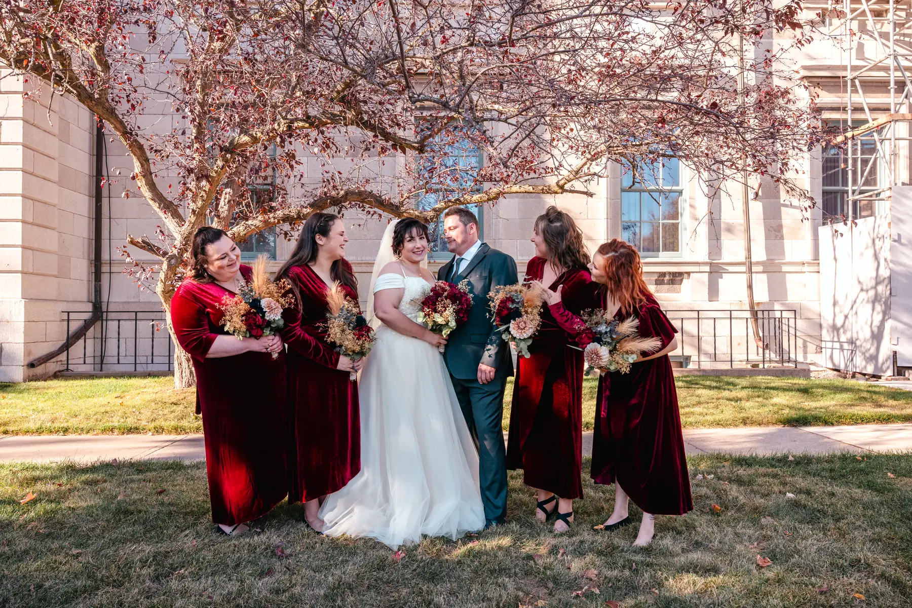 The bride and bridesmaids outdoors at Kody and Jaz’s wedding.