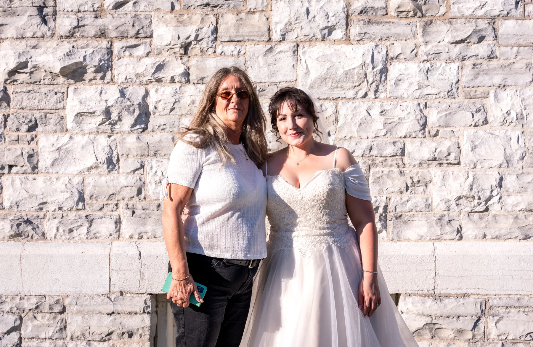The bride posing outside the church at Kody and Jaz’s wedding.