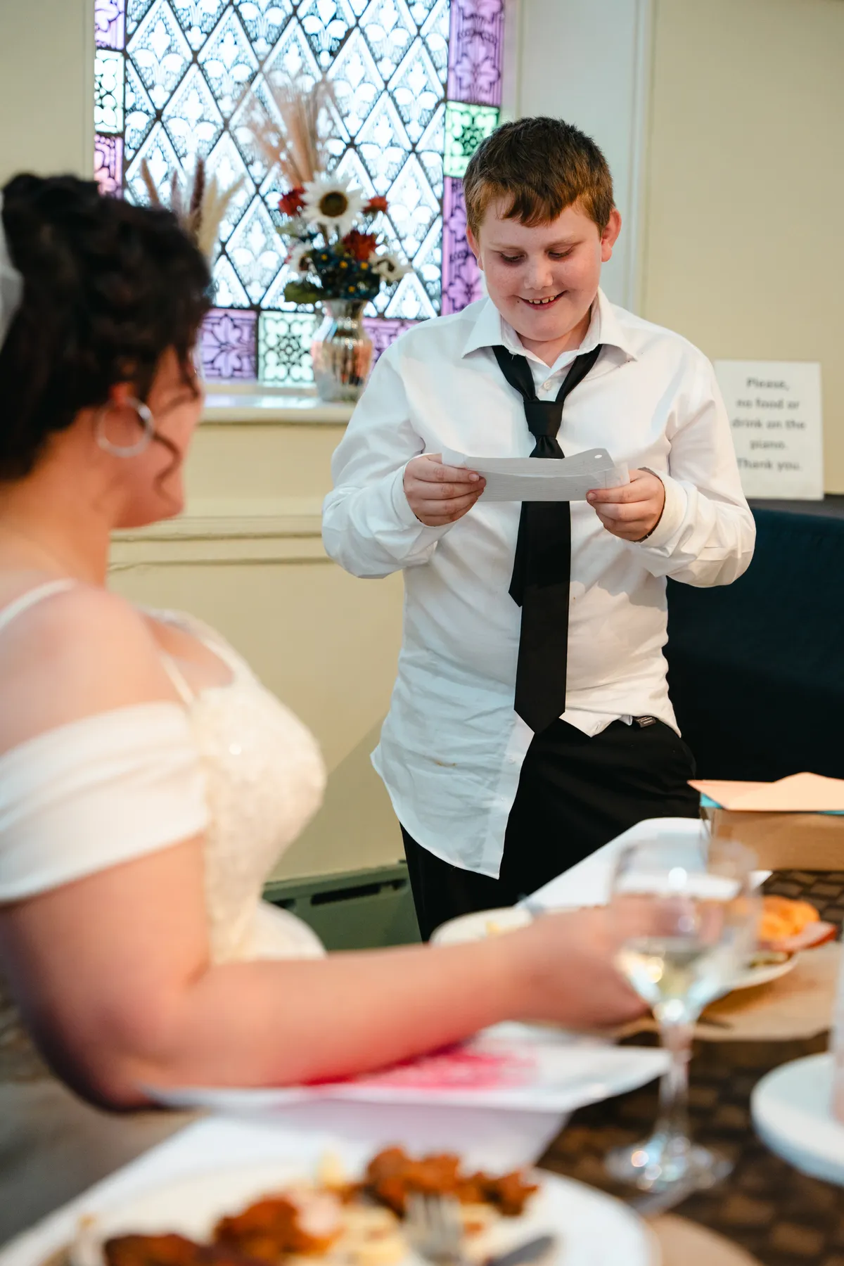 The bride greeting and hugging guests at Kody and Jaz’s wedding.