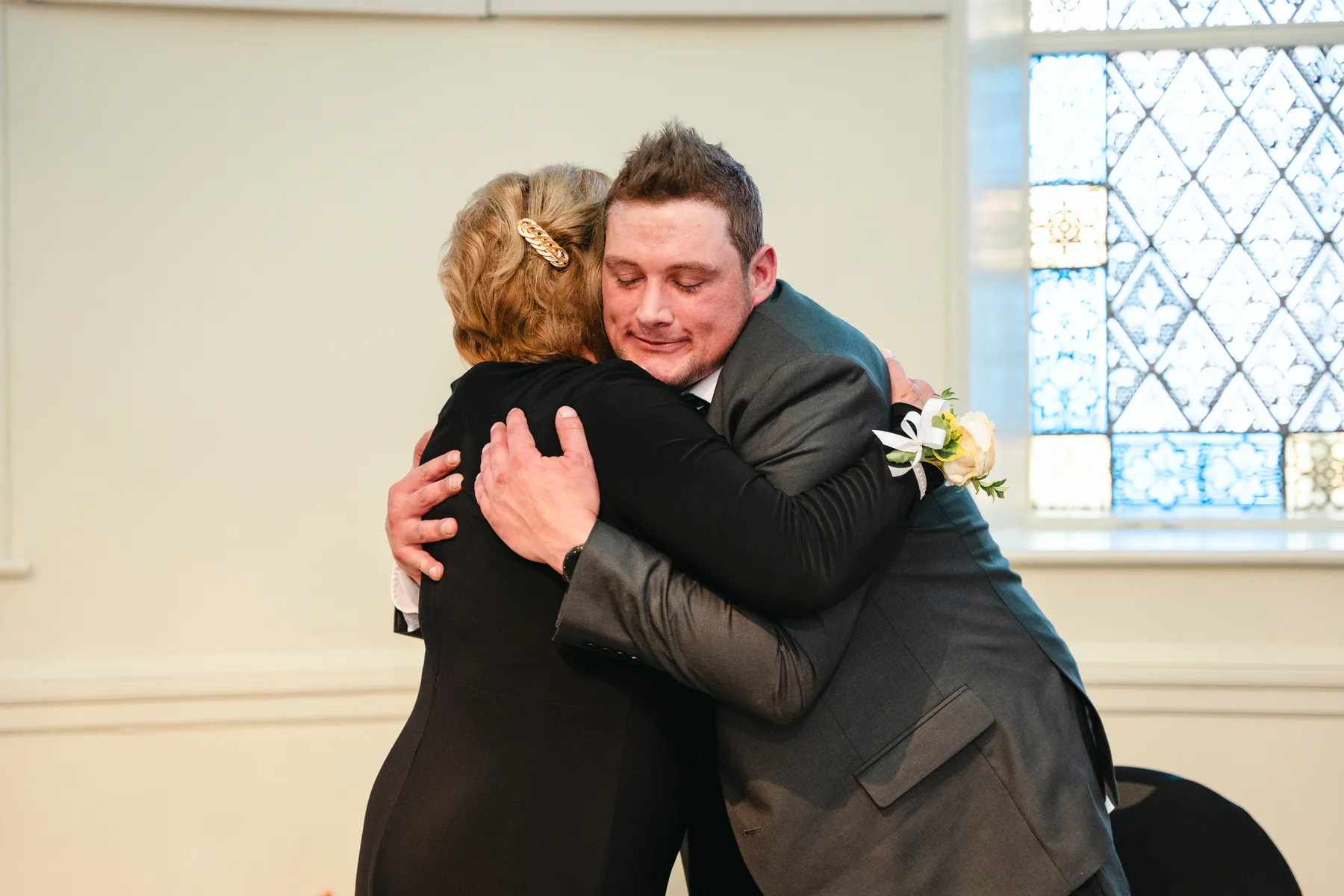 The couple and guests reacting to the speeches at Kody and Jaz’s wedding.