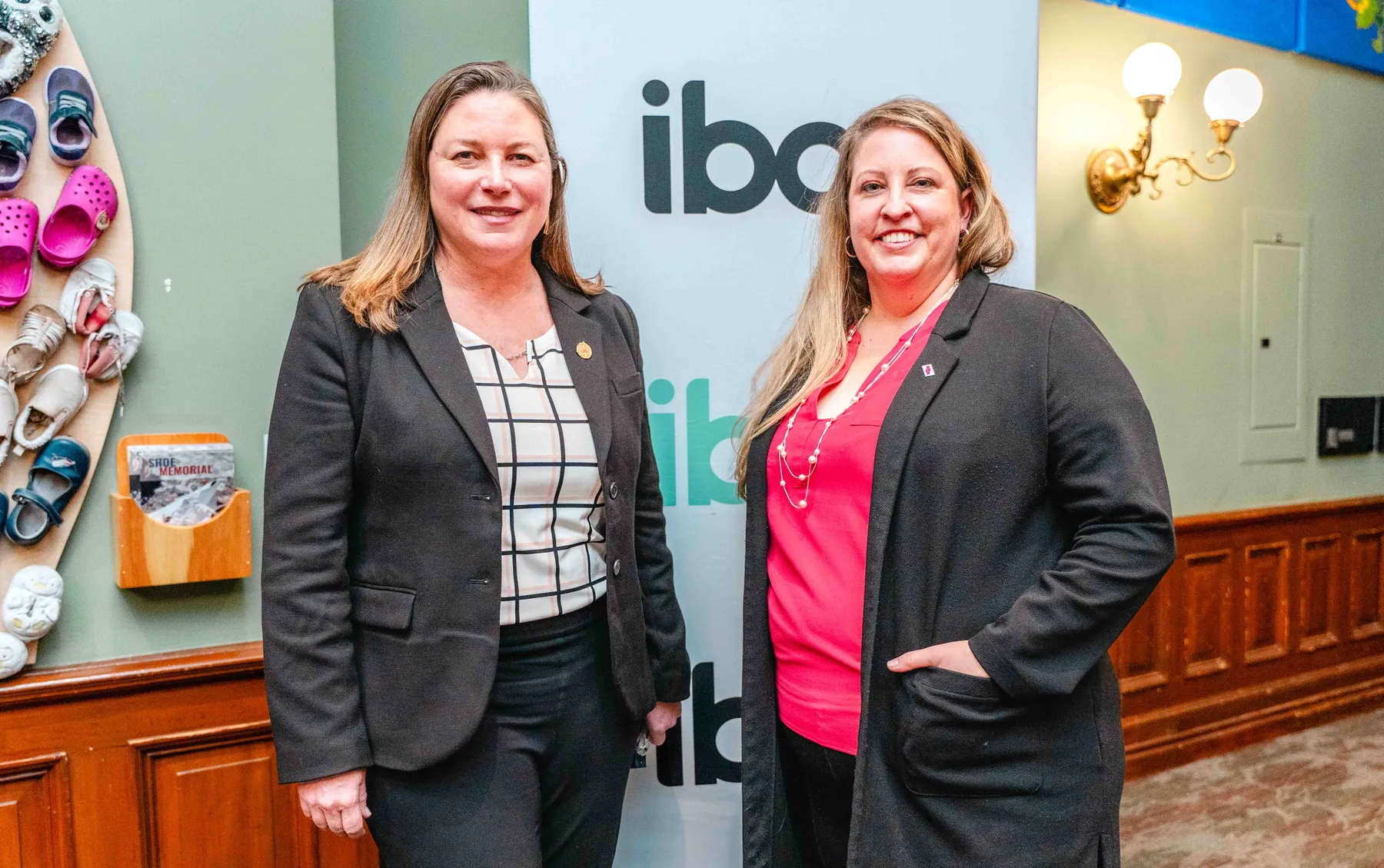 Two women posing together at the IBAO event at Queen’s Park.